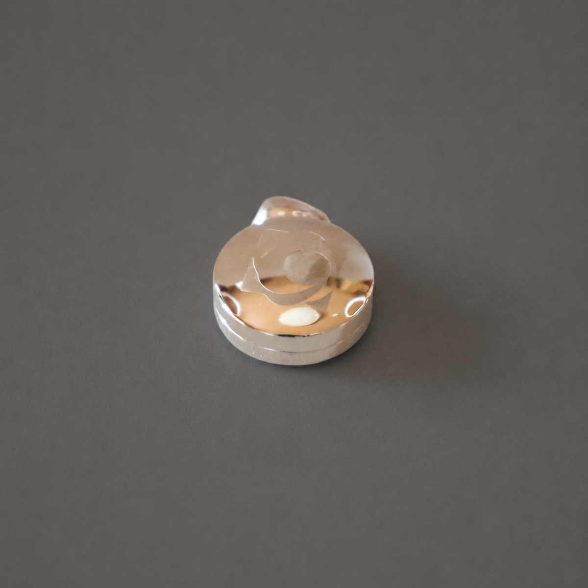 ORBITRON Silver Pendant 3.0: angled view of the pendant